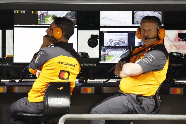 Zak Brown McLaren CEO discusses team strategy with Andrea Stella